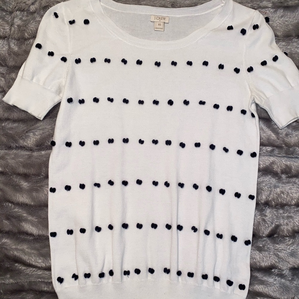 J. Crew short sleeved Pom Pom top.